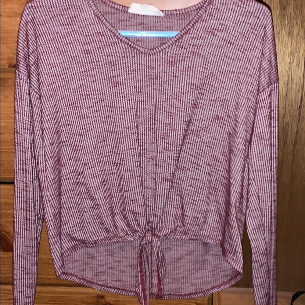 long sleeved maroon shirt